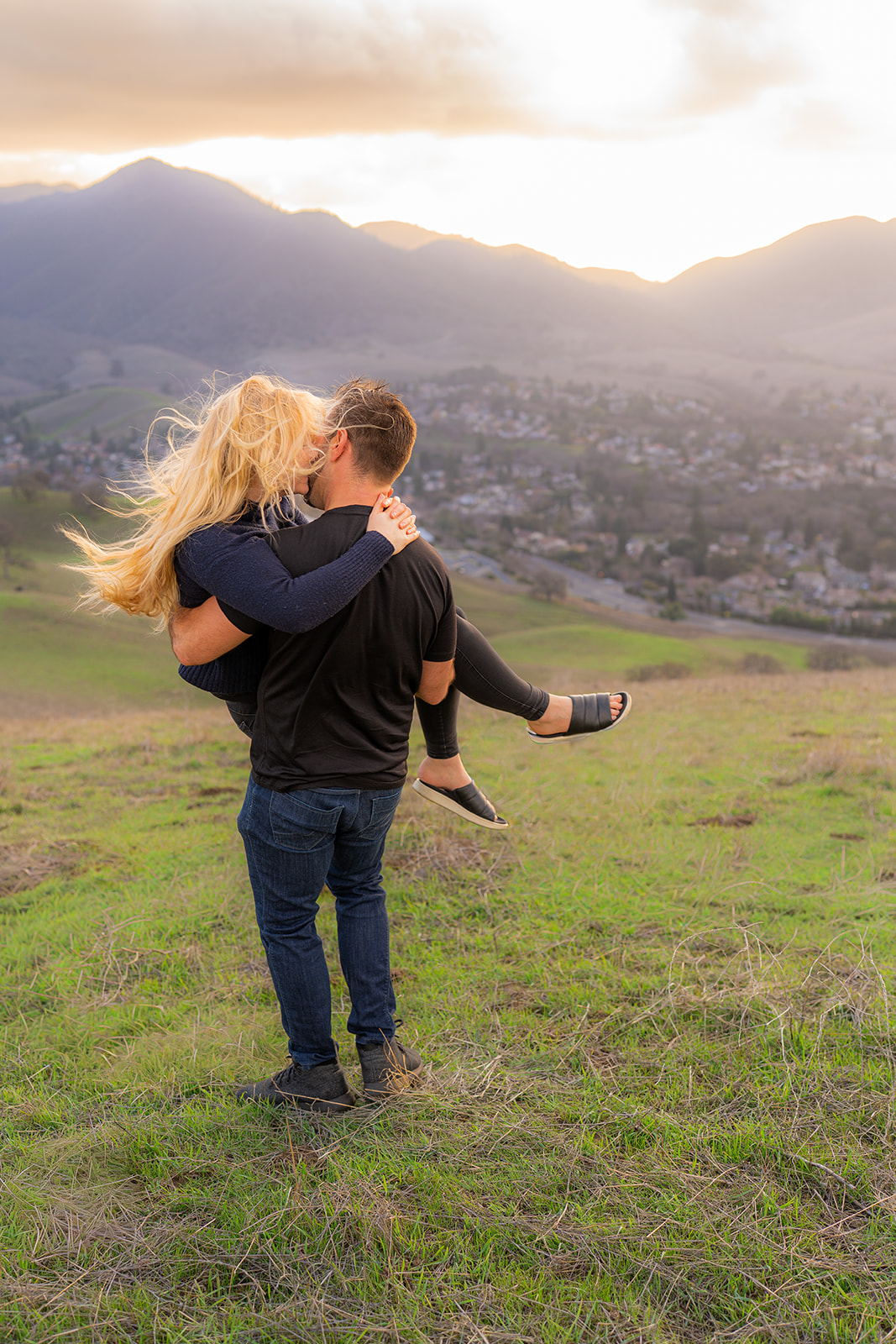 Couple photographed at sunset with sweeping mountain views in Walnut Creek, California