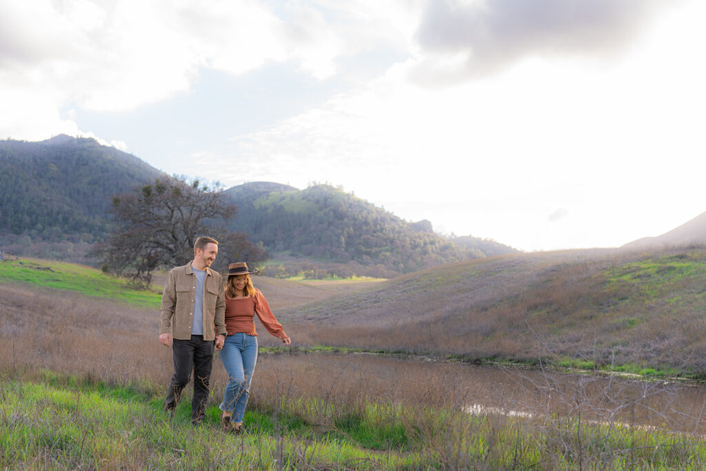 Couple together in an open field along the Mt. Diablo mountainside during a Bay Area couples photography session